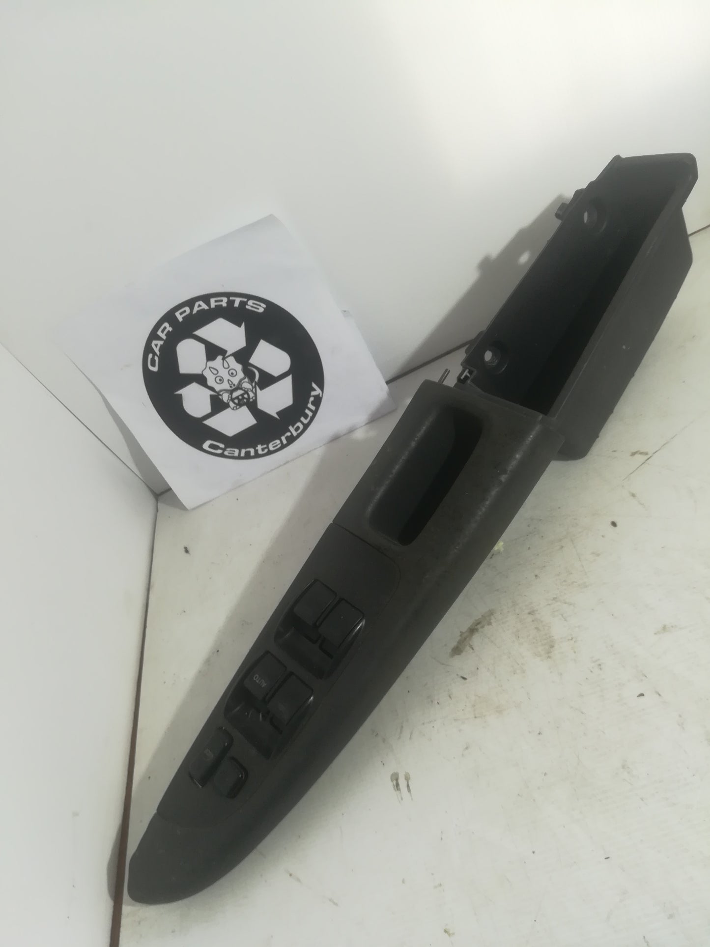 Window Switch Surround/Door cup - Driver side
