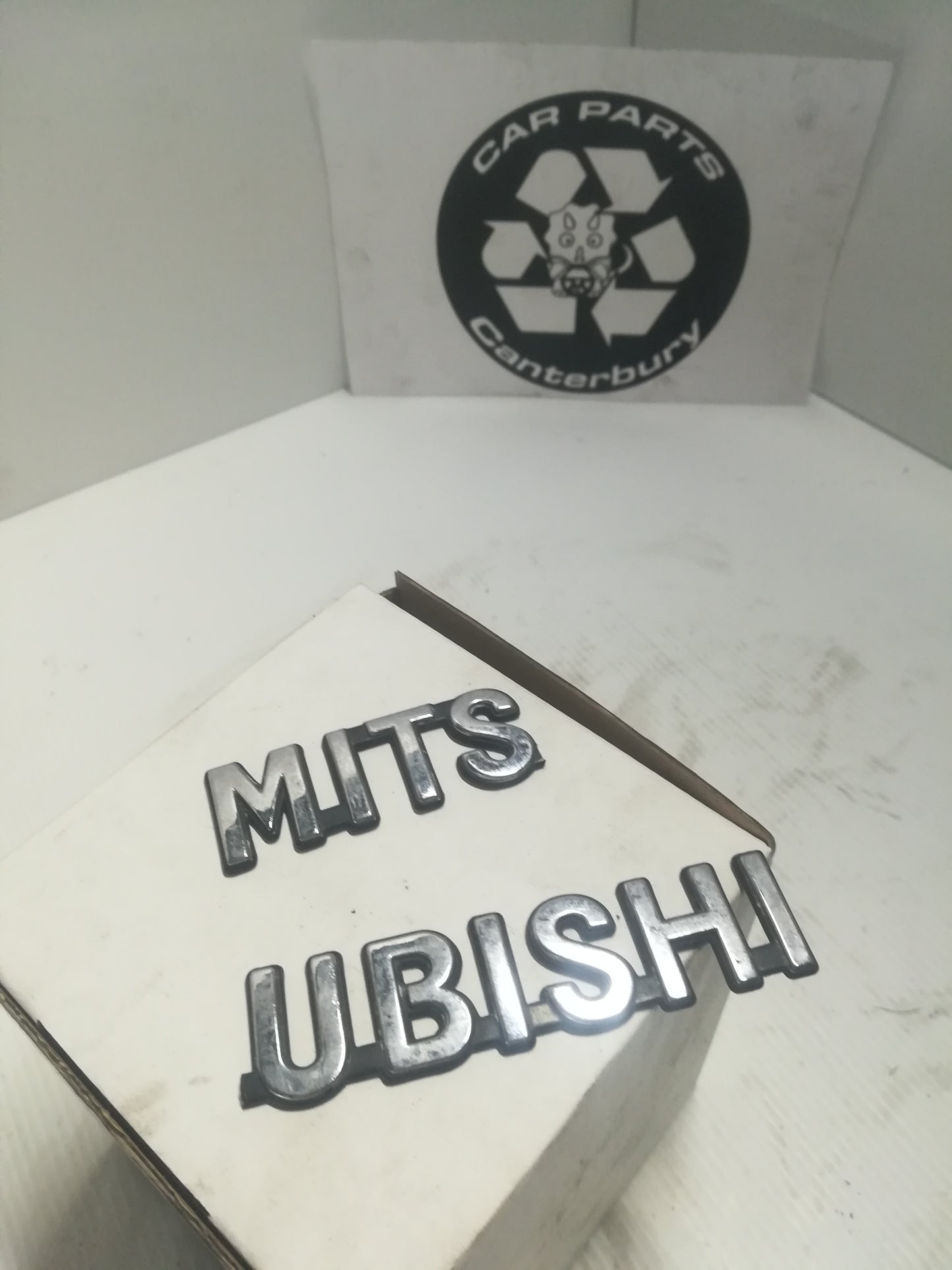 Mitsubishi Badge